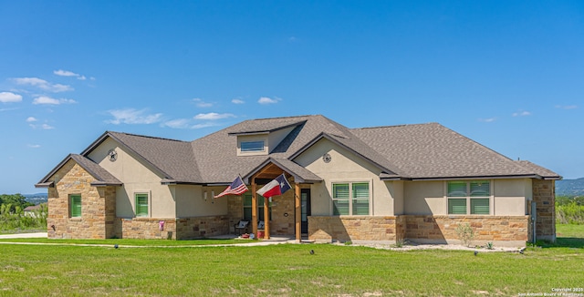 919 Pinto Cyn, Bandera, TX 78003 - view of front of house featuring stone siding, stucco siding, and roof with shingles
