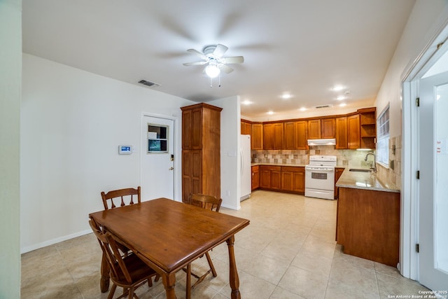 2814 Rim Rock, San Antonio, TX 78251 - dining space with a ceiling fan and light tile patterned floors