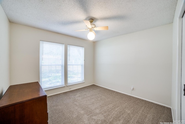2814 Rim Rock, San Antonio, TX 78251 - unfurnished bedroom with carpet floors, a ceiling fan, and a textured ceiling