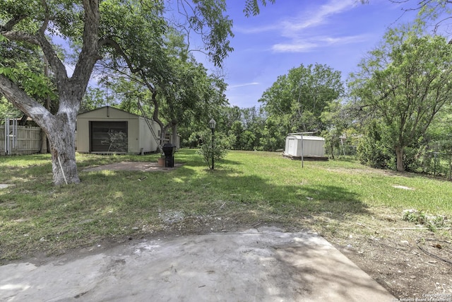 11115 Rendezvous, San Antonio, TX 78216 - view of yard featuring a storage shed