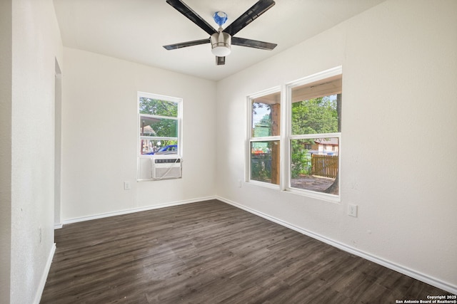 211 Sylvia, San Antonio, TX 78237 - spare room with dark wood-style flooring, ceiling fan, and cooling unit