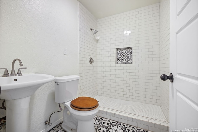 211 Sylvia, San Antonio, TX 78237 - full bathroom featuring a stall shower and tile patterned flooring