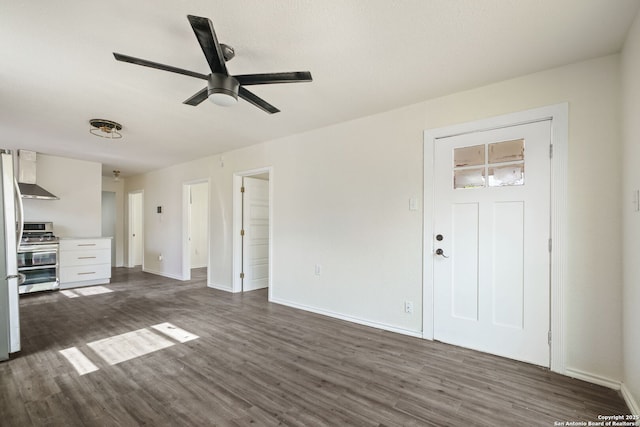 211 Sylvia, San Antonio, TX 78237 - unfurnished living room featuring dark wood finished floors and a ceiling fan