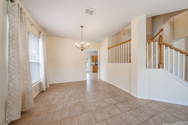 22815 Cardigan Chase, San Antonio, TX 78260 - tiled empty room featuring healthy amount of natural light, a chandelier, stairway, and arched walkways