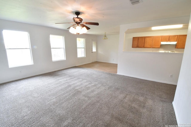 1510 June Berry, San Antonio, TX 78260 - unfurnished living room with carpet flooring and ceiling fan