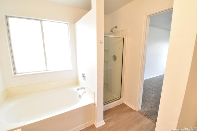 1510 June Berry, San Antonio, TX 78260 - full bath with a garden tub, a stall shower, and wood finished floors