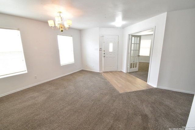 1510 June Berry, San Antonio, TX 78260 - entrance foyer featuring carpet and a chandelier