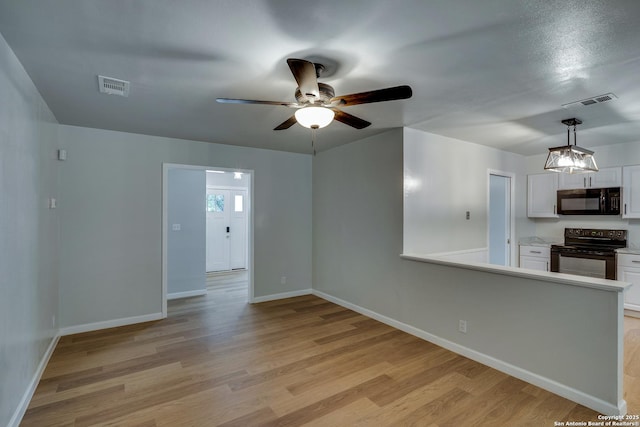 8302 Hastings, San Antonio, TX 78239 - empty room with light wood-type flooring and a ceiling fan