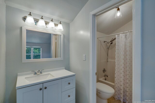 8302 Hastings, San Antonio, TX 78239 - bathroom featuring vanity, shower / tub combo, lofted ceiling, and tile patterned floors
