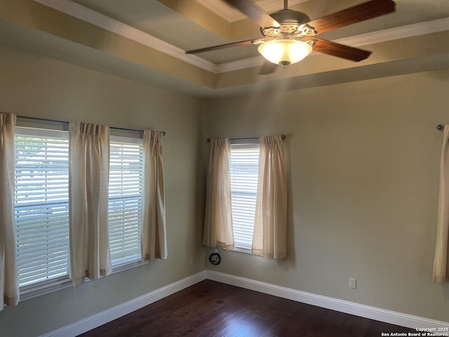 812 33rd St, Hondo, TX 78861 - empty room featuring crown molding, ceiling fan, and dark wood-style floors