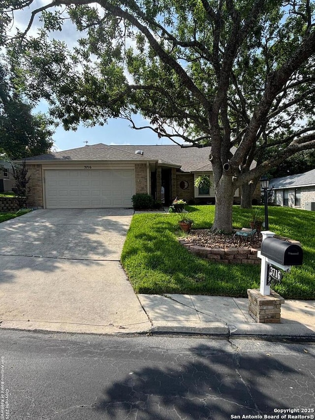 3716 Scenic Dr, Schertz, TX 78108 - single story home with a garage, driveway, a front yard, and brick siding