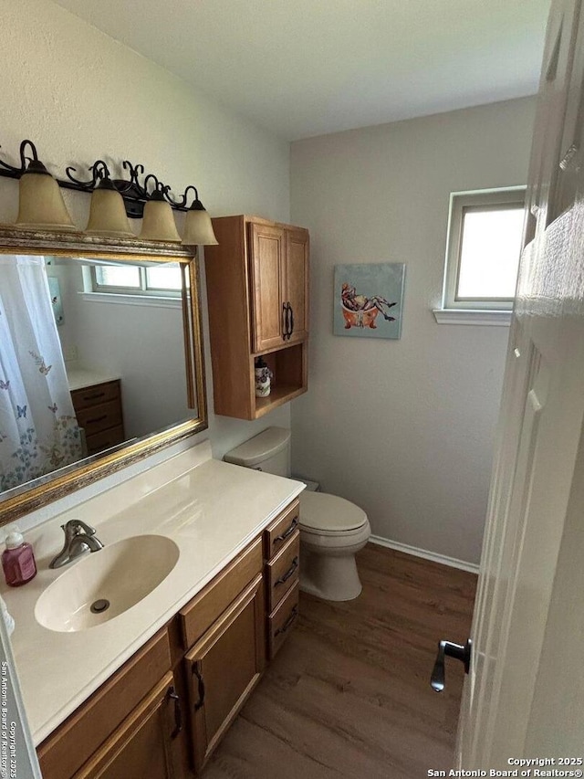 3716 Scenic Dr, Schertz, TX 78108 - bathroom featuring wood finished floors and vanity