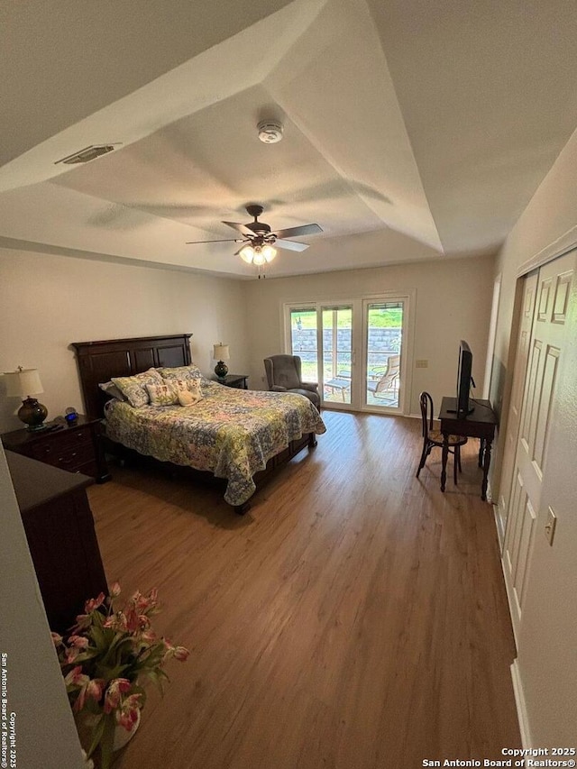 3716 Scenic Dr, Schertz, TX 78108 - bedroom with wood finished floors, access to exterior, ceiling fan, and a closet
