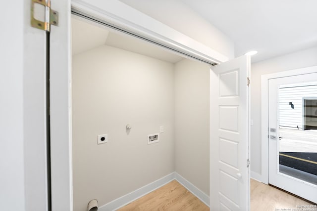 419 Ira Ave Unit 1101, San Antonio, TX 78209 - laundry area featuring electric dryer hookup, hookup for a washing machine, light wood finished floors, and gas dryer hookup