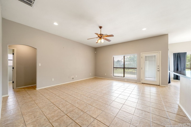 312 Bunker Hl, Pleasanton, TX 78064 - spare room featuring ceiling fan, light tile patterned flooring, arched walkways, and recessed lighting