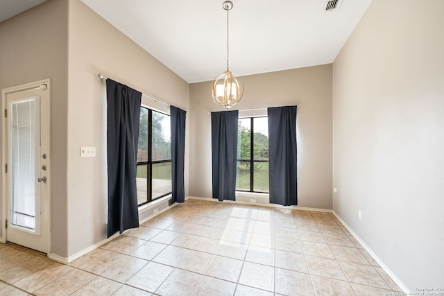 312 Bunker Hl, Pleasanton, TX 78064 - empty room featuring a chandelier and light tile patterned floors