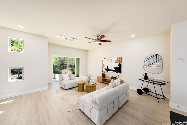 419 Ira Ave Unit 1102, San Antonio, TX 78209 - living area with light wood-style flooring, ceiling fan, and recessed lighting