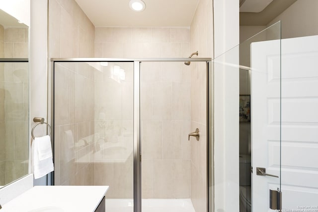 419 Ira Ave Unit 1102, San Antonio, TX 78209 - full bathroom with vanity, a shower stall, and recessed lighting