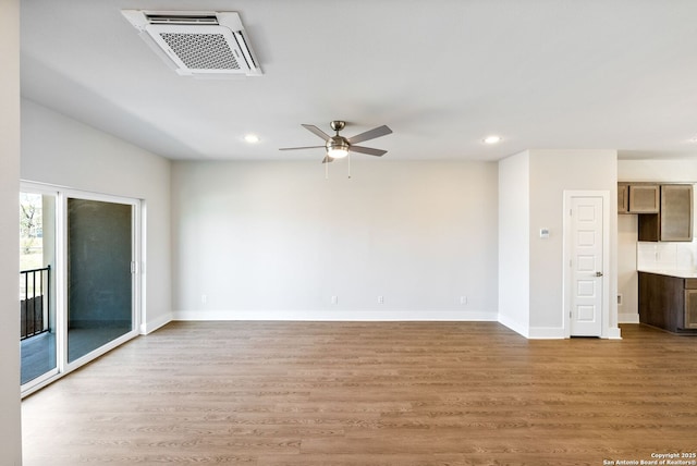 419 Ira Ave Unit 2101, San Antonio, TX 78209 - unfurnished living room with recessed lighting, ceiling fan, and wood finished floors