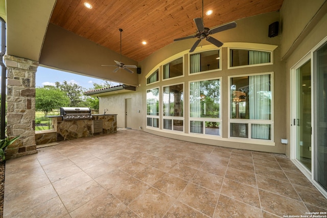 1437 Decanter, New Braunfels, TX 78132 - view of patio / terrace with ceiling fan and an outdoor kitchen