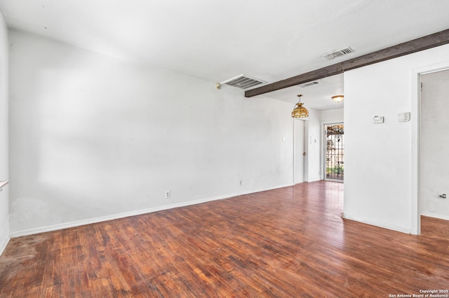 231 Craigmont, San Antonio, TX 78213 - spare room with wood finished floors, beam ceiling, and a chandelier