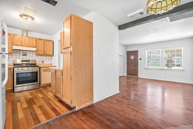 231 Craigmont, San Antonio, TX 78213 - kitchen featuring gas range, dark wood finished floors, under cabinet range hood, light countertops, and light brown cabinets