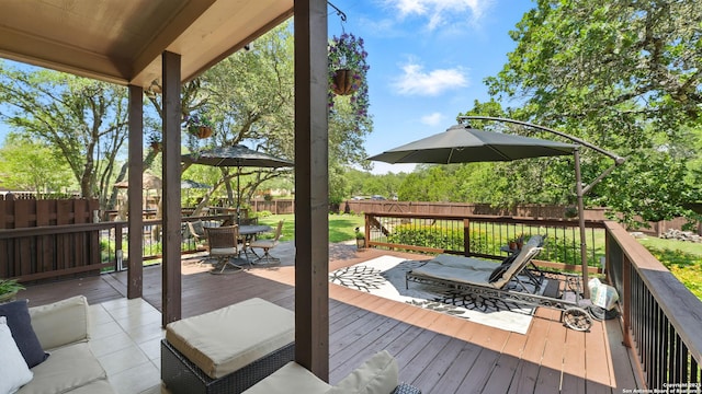 212 Wentworth, Spring Branch, TX 78070 - wooden deck featuring outdoor dining space and a fenced backyard