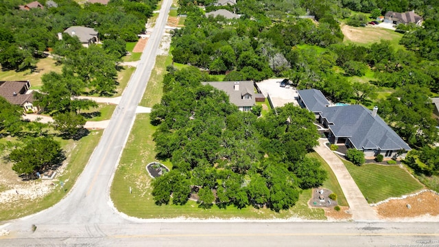 212 Wentworth, Spring Branch, TX 78070 - aerial view of residential area with a tree filled landscape
