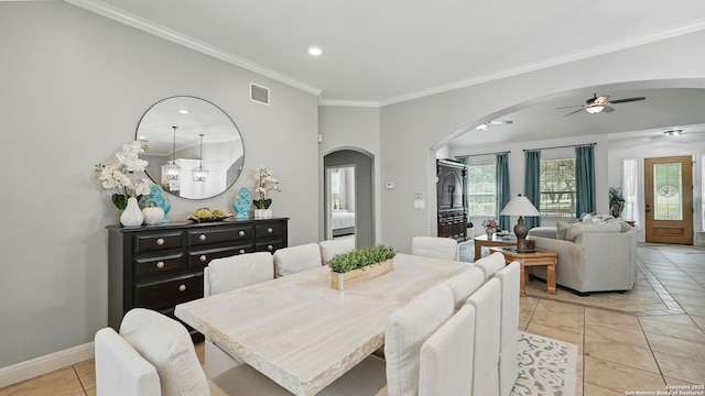 212 Wentworth, Spring Branch, TX 78070 - dining space featuring arched walkways, ornamental molding, light tile patterned flooring, ceiling fan, and recessed lighting