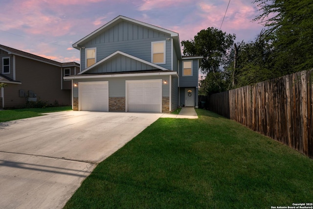 315 Bundy, San Antonio, TX 78220 - view of front of property featuring concrete driveway, board and batten siding, and stone siding