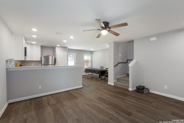 315 Bundy, San Antonio, TX 78220 - living room featuring dark wood-style flooring, recessed lighting, a ceiling fan, and stairway