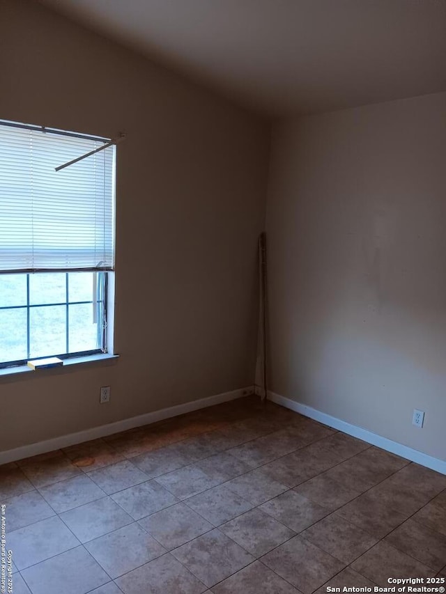 6122 Haven Vly, San Antonio, TX 78242 - empty room featuring baseboards and tile patterned flooring