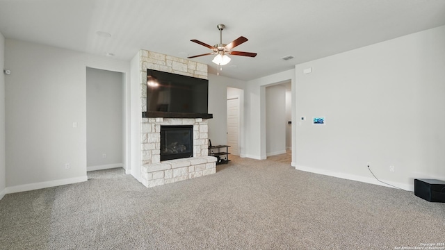 1606 Folk Victorian, New Braunfels, TX 78132 - unfurnished living room featuring a ceiling fan, a fireplace, and carpet