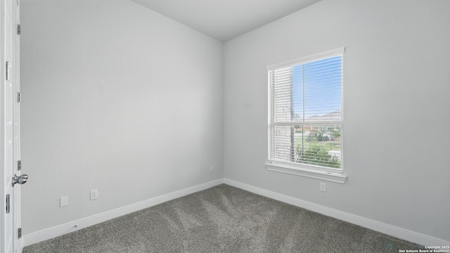 1606 Folk Victorian, New Braunfels, TX 78132 - spare room featuring dark colored carpet and baseboards