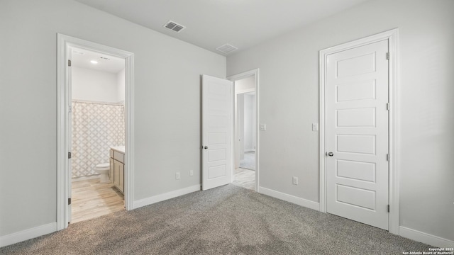 1606 Folk Victorian, New Braunfels, TX 78132 - unfurnished bedroom featuring light colored carpet and ensuite bathroom