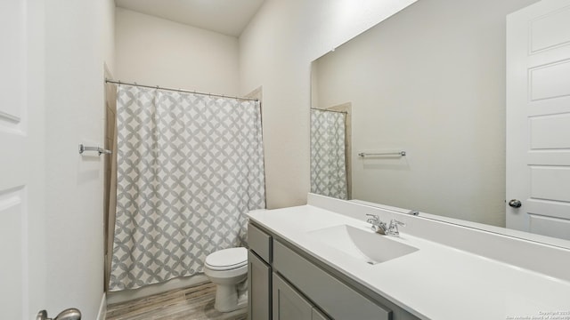 1606 Folk Victorian, New Braunfels, TX 78132 - full bath featuring vanity, wood finished floors, and curtained shower
