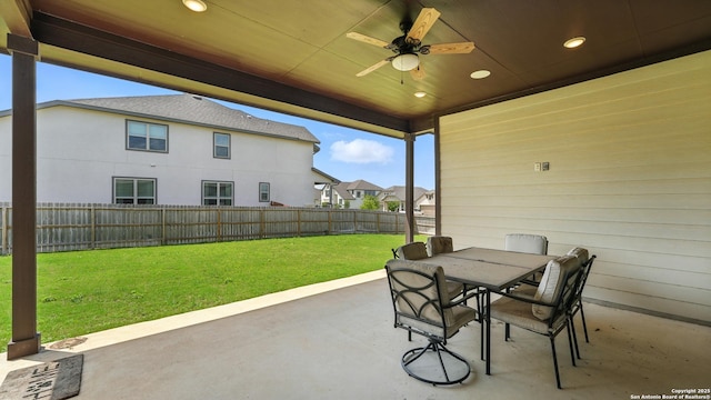 1606 Folk Victorian, New Braunfels, TX 78132 - fenced backyard with a patio area, ceiling fan, and outdoor dining space