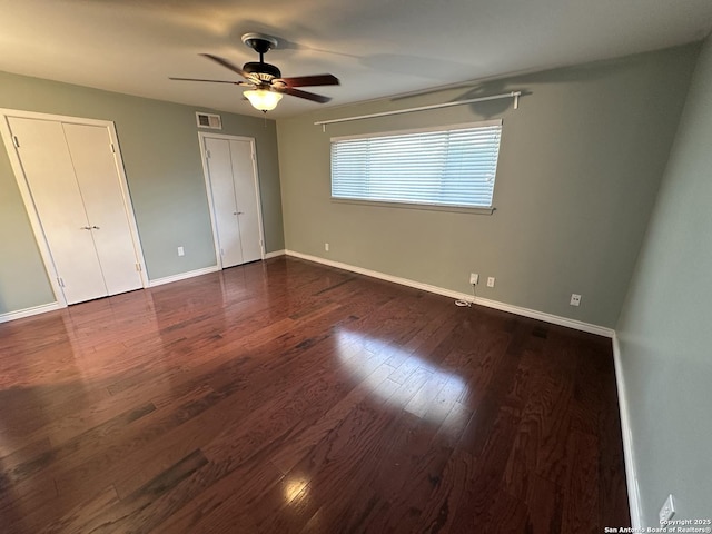 105 W Silver Sands Unit 105A, San Antonio, TX 78216 - unfurnished bedroom with dark wood-type flooring and ceiling fan
