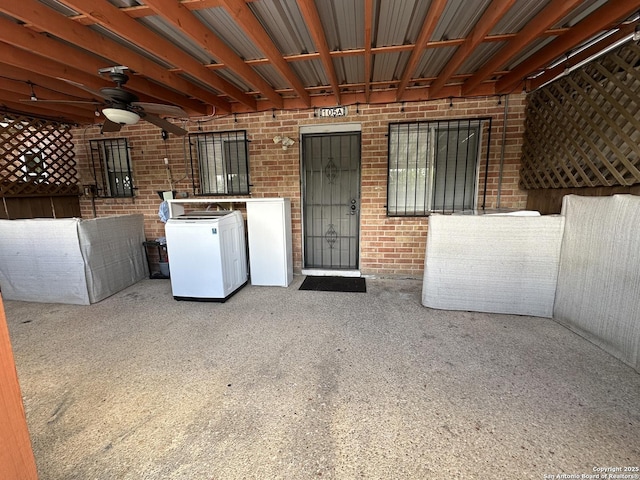 105 W Silver Sands Unit 105A, San Antonio, TX 78216 - property entrance with washer and clothes dryer and a ceiling fan