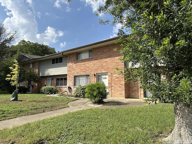 105 W Silver Sands Unit 105A, San Antonio, TX 78216 - multi unit property featuring brick siding and a front lawn