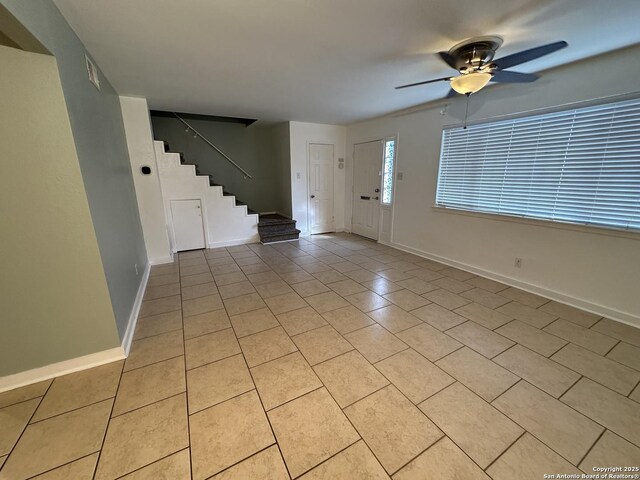 105 W Silver Sands Unit 105A, San Antonio, TX 78216 - foyer entrance featuring stairs, light tile patterned floors, and a ceiling fan