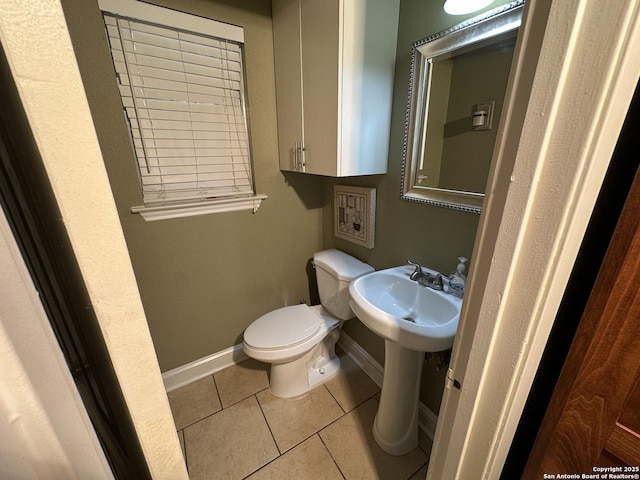 105 W Silver Sands Unit 105A, San Antonio, TX 78216 - half bath featuring toilet and tile patterned flooring