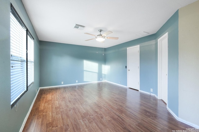 9003 Timber Frk, San Antonio, TX 78250 - spare room with ceiling fan and wood finished floors