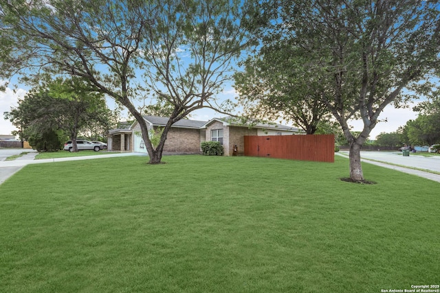 9003 Timber Frk, San Antonio, TX 78250 - view of front of home with driveway and a garage