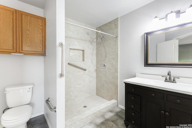 9003 Timber Frk, San Antonio, TX 78250 - full bathroom featuring vanity, tiled shower, and tile patterned floors