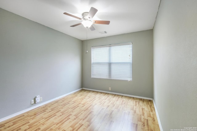 9003 Timber Frk, San Antonio, TX 78250 - empty room with wood finished floors and ceiling fan