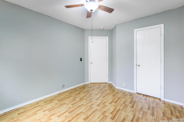 9003 Timber Frk, San Antonio, TX 78250 - unfurnished bedroom featuring wood finished floors and a ceiling fan