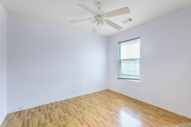 9003 Timber Frk, San Antonio, TX 78250 - empty room with light wood finished floors and ceiling fan