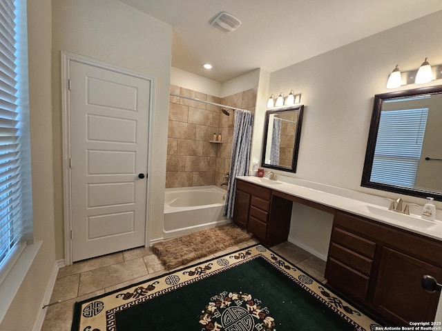 111 Lone Fls, Universal City, TX 78148 - full bath with double vanity, shower / bath combo, and tile patterned flooring