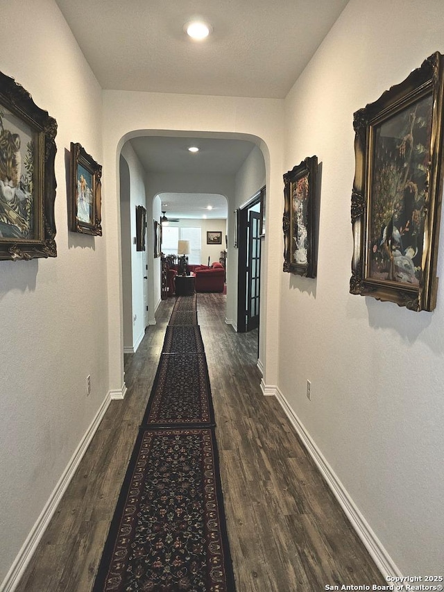 111 Lone Fls, Universal City, TX 78148 - corridor with arched walkways, wood finished floors, and recessed lighting